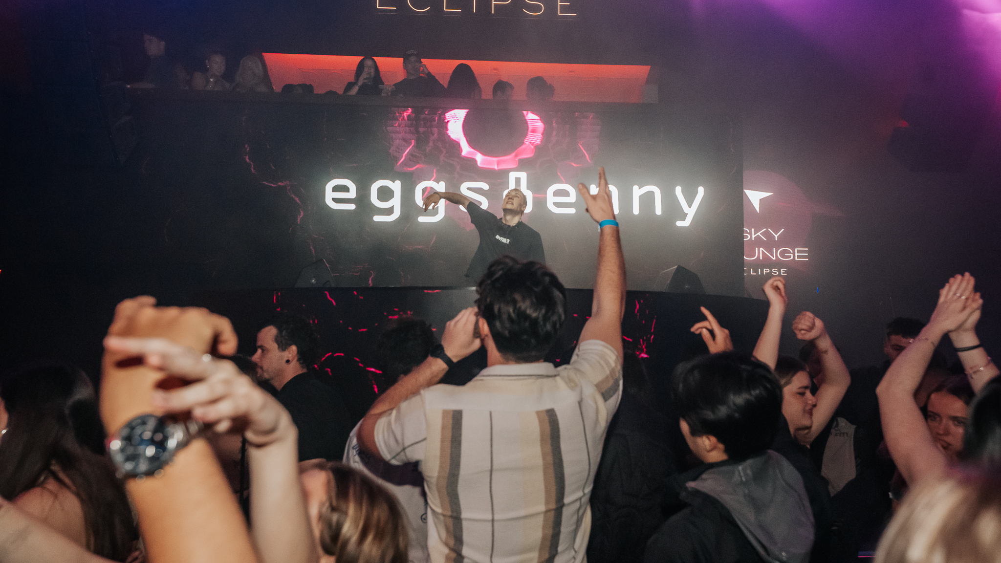 DJ behind decks at Gold Coast venue