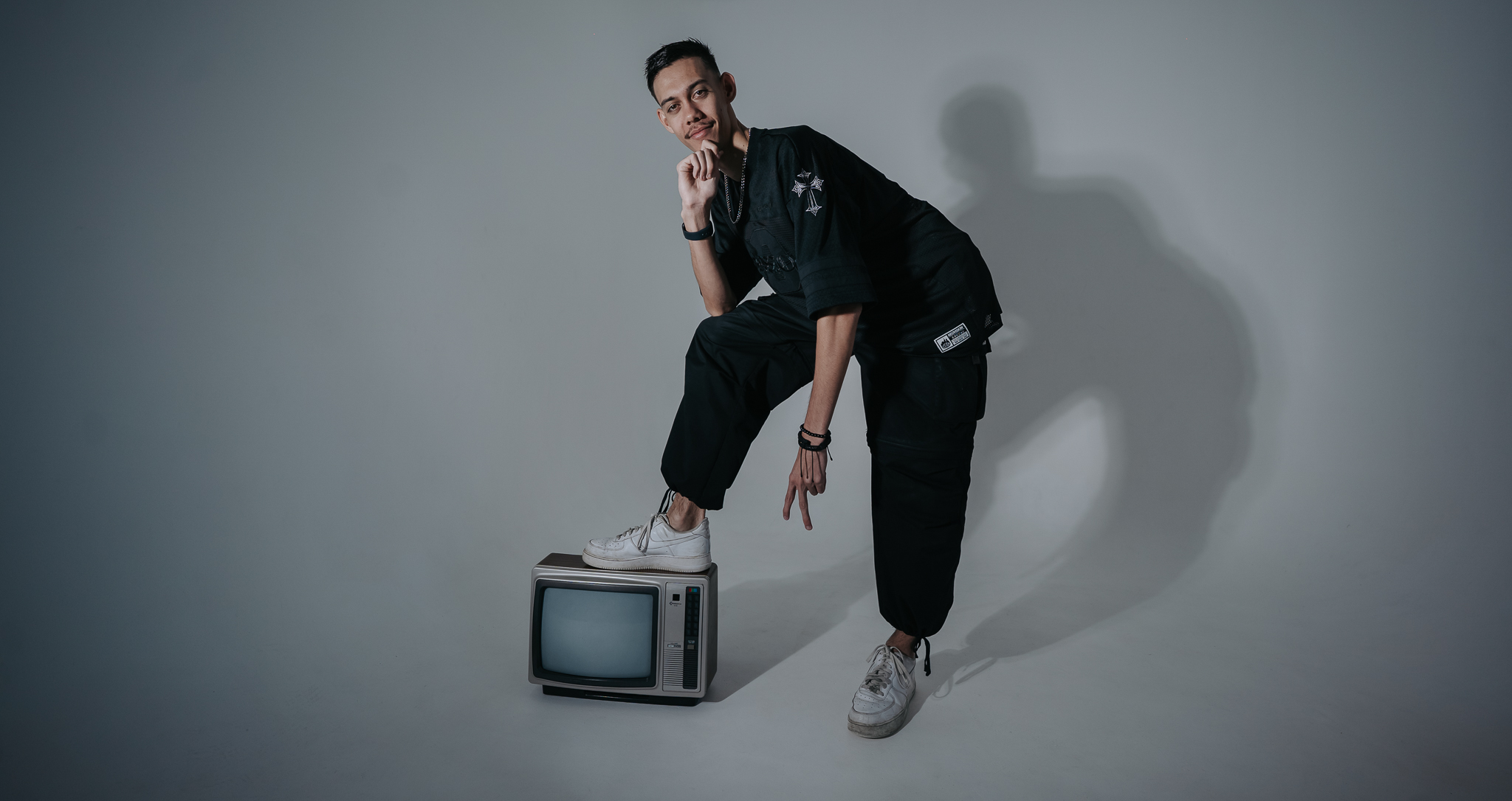 Stylised studio press photo with vintage TV, Gold Coast